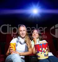 Two young girls in cinema