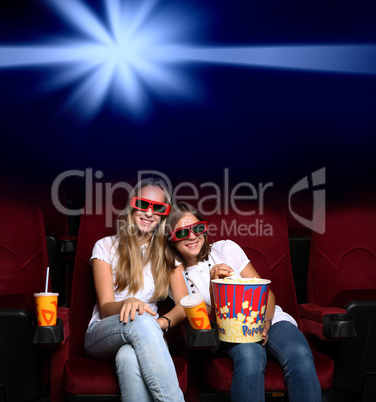 Two young girls in cinema