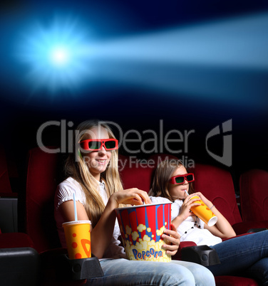 Two young girls in cinema