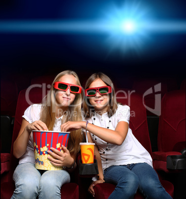 Two young girls in cinema