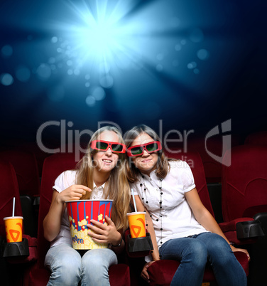 Two young girls in cinema