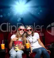 Two young girls in cinema