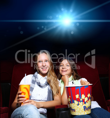 Two young girls in cinema