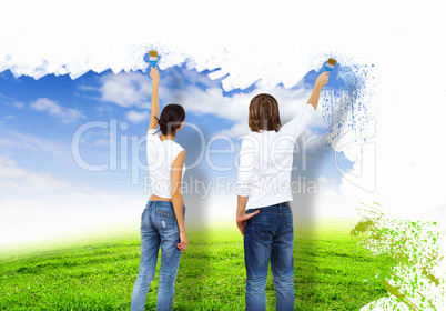 Young couple with paint brushes together