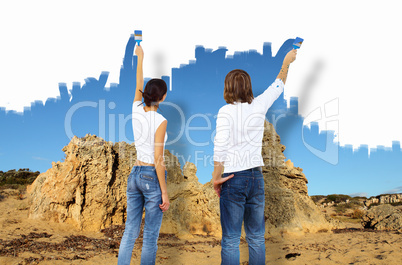 Young couple with paint brushes together