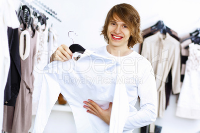 Young man doing shopping