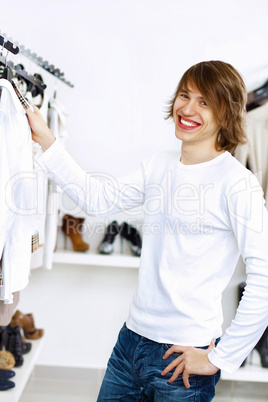 Young man doing shopping