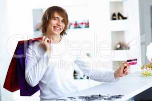 Young man doing shopping