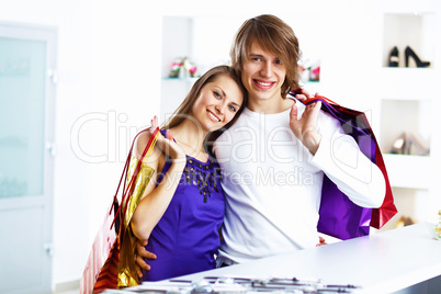 Young couple doing shopping together