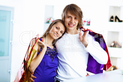 Young couple doing shopping together