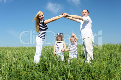 family with children in summer day outdoors