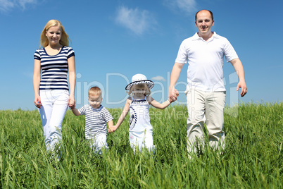 family with children in summer day outdoors