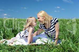 mother with her daughter outdoors