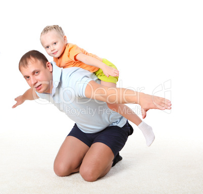 father and little daughter doing sport