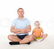 father and little daughter doing sport