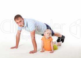 father and little daughter doing sport