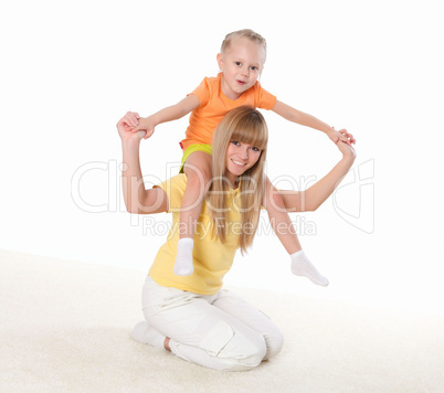 mother and little daughter doing sport together