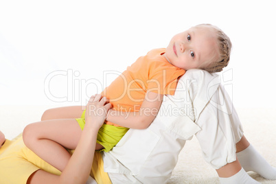 mother and little daughter doing sport together