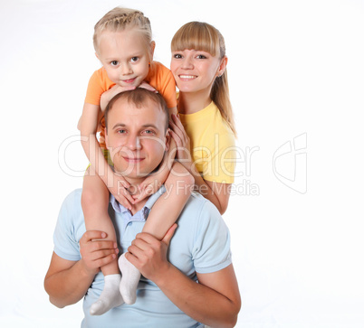 family with a little daughter doing sport together
