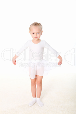 little girl doing gymnastics