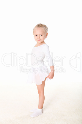 little girl doing gymnastics