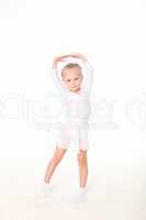 little girl doing gymnastics
