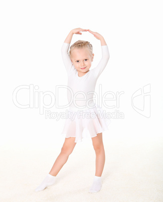 little girl doing gymnastics