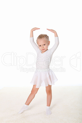 little girl doing gymnastics