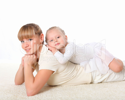 mother and little daughter doing sport together