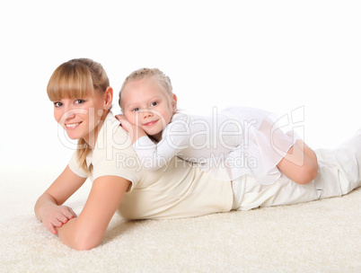 mother and little daughter doing sport together