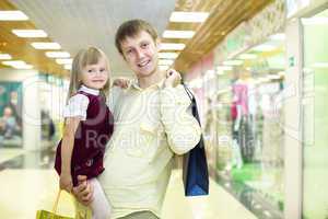 Young family doing shopping