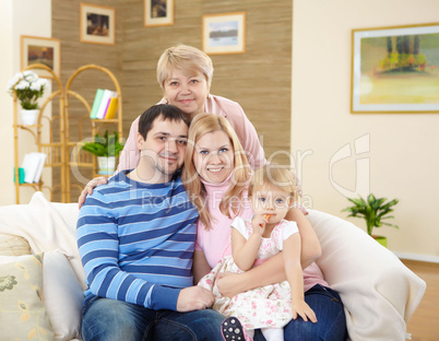 grandmother with her family at home