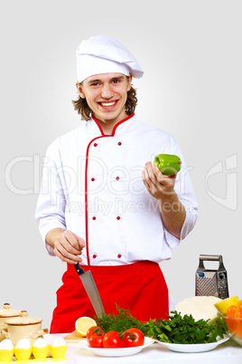 Portrait of a young cook in uniform