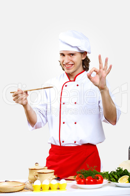 Portrait of a young cook in uniform