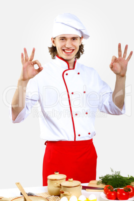 Portrait of a young cook in uniform