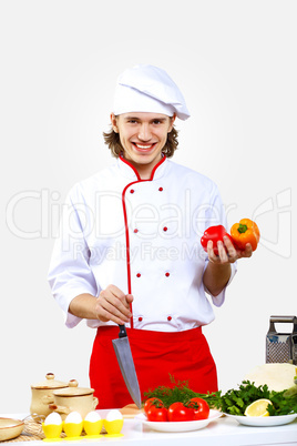 Portrait of a young cook in uniform