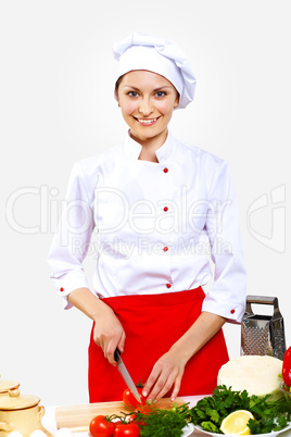 Portrait of a young cook in uniform