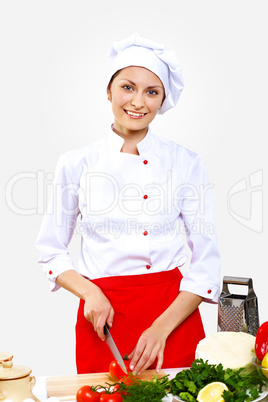 Portrait of a young cook in uniform