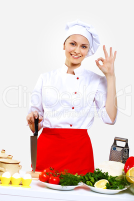 Portrait of a young cook in uniform