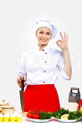 Portrait of a young cook in uniform