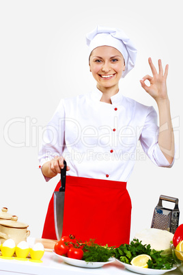 Portrait of a young cook in uniform