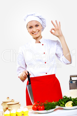 Portrait of a young cook in uniform