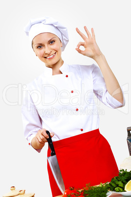 Portrait of a young cook in uniform