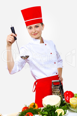 Portrait of a young cook in uniform