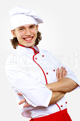 Portrait of a young cook in uniform