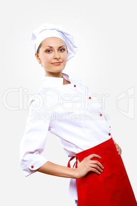 Portrait of a young cook in uniform