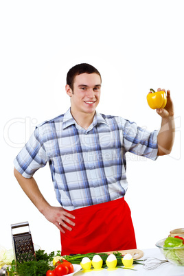 Man cooking fresh meal at home