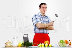 Man cooking fresh meal at home