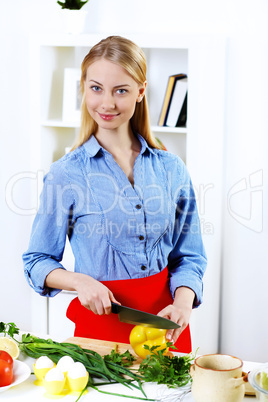 Woman cooking fresh meal at home