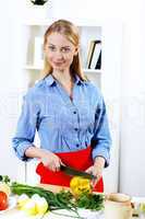 Woman cooking fresh meal at home
